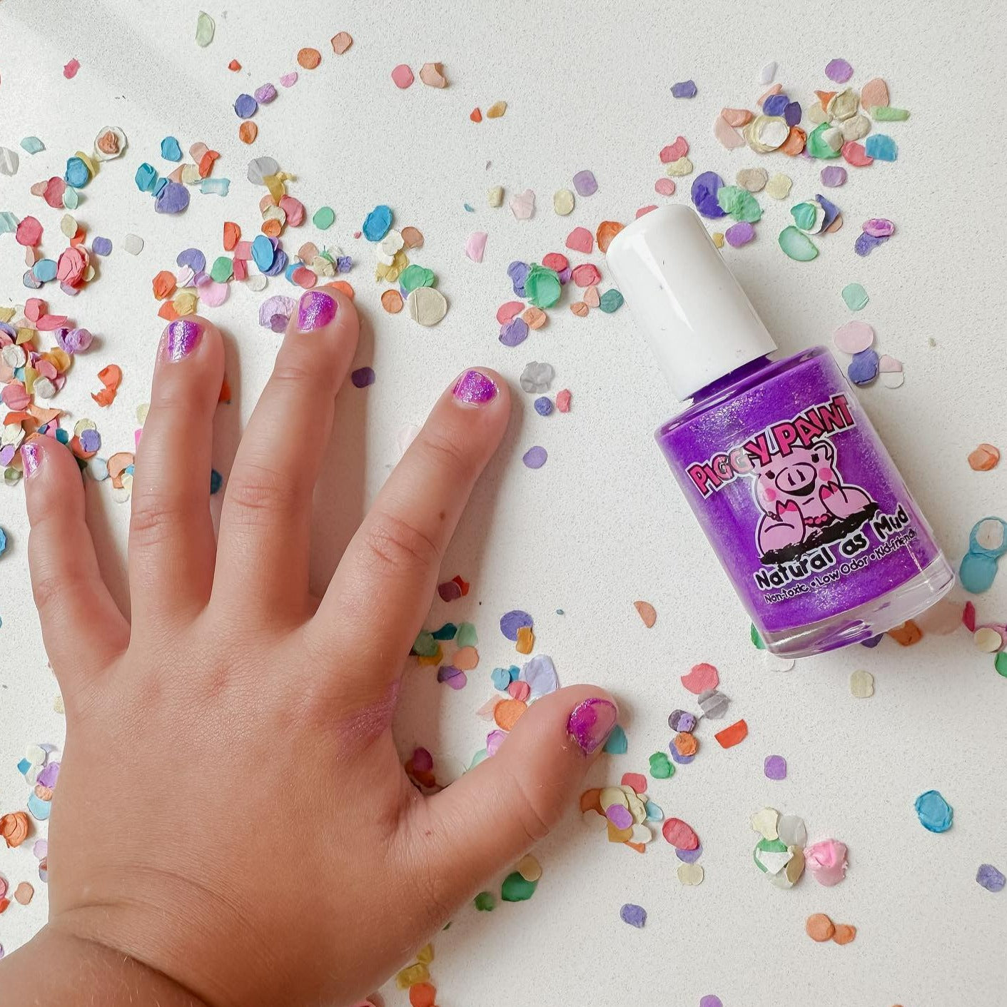 Premium Photo | A nail art design with purple glitter and purple glitter